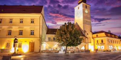 Amazing View of Lesser Square and Council Tower in the center of Sibiu city. Impressive scene of Transylvania.  Location: Sibiu, Transylvania region, Romania, Europe